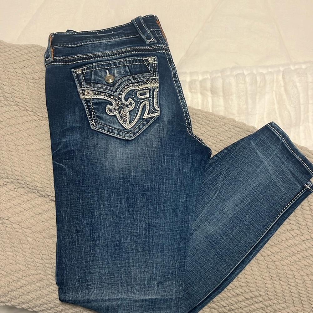 Mid rise woman’s rock revival ankle skinny jeans